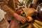 Homosexual male pair washing vegetables in kitchen