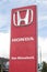 Honda car automotive dealership sign showing logo and branding