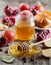 Honey, apple, pomegranate and bread hala, table set with traditional food for Jewish New Year Holiday, Rosh Hashana