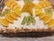 Honey cake with orange and kiwi