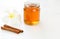 Honey, cinnamon with Plumeria on white background