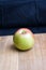 Honey-crisp apple on wooden butcher block