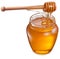 Honey flowing into glass jar.