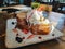 honey french toast with berry & x28;strawberry and blueberry& x29;, vanilla ice cream and chocolate jam in coffee shop or cafe