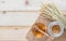 Honey in glass bowl and jar with dipper, healthy nutritional organic food from bee good for health, on wood table