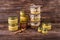 Honey in a glass jar on a dark wooden background