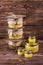 Honey in a glass jar on a dark wooden background