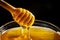 Honey with gold color flows down from a spoon. Healthy food concept. Healthy eating. Diet. Selective focus.