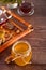 Honey in jar and honeycomb in small bowls. Teapot and cup of tea on the background.