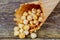 Honey peanuts with caramel popcorn in sugar cones