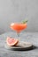 Honey rosemary grapefruit sodas on grey