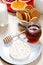 Honey and white waffle on a table