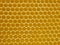 Honeycomb. Geometric, closeup. Yellow Honey cells texture background. Concept of beekeeping