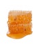 Honeycomb isolated single piece with liquid honey on white background