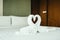 Honeymoon bed with swan towel with heart decoration