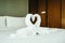 Honeymoon bed with swan towel with heart decoration