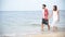 Honeymoon couple lover walking on the beach romantic relationship happiness moment with love lifestyle. Couple lover walk a long b