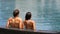 Honeymoon couple relaxing together - swimming pool