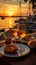 A honeymoon sunset dinner by the beach, with a table set for two, luxurious cuisine