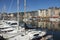 HONFLEUR, FRANCE - July 29, 2019: sailboats and pleasure boats are anchored in the port of Honfleur, France