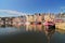 Honfleur harbour in Normandy France. Color houses and their reflection in water