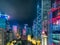 Hong Kong - 09 February 2018 - Futuristic Dystopian City Skyline at Night with Neon Lights and Skyscrapers in Central Hong Kong