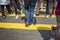 Hong KONG, CHAINA April 14,2018: People Tourist  visiting crossing a very busy yellow crossroads in the central district. Hong