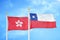 Hong Kong and Chile two flags on flagpoles and blue cloudy sky