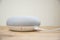 Hong Kong, China - 11 March, 2018: Physical microphone switch button of the Google Home Mini Chalk color on a wooden surface