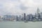 Hong Kong, China - August 15, 2018 : Modern skyscrapers and ferry transportation traffic at Victoria Harbor