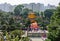 Hong Kong, China: People crowd by Buddhist Pavilion of Absolute Perfection aka Golden Pagoda in Nan Lian Garden at Diamond Hill.