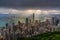 Hong Kong city skyline from Victoria peak, China with dramatic sky