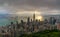 Hong Kong city skyline from Victoria peak, China with dramatic sky