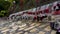 Hong Kong - January 1 2020 : Chain of Tin Cans, Red and Silver Tin Cans hanging on the rope in Tai O Village