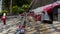 Hong Kong - January 1 2020 : Chain of Tin Cans, Red and Silver Tin Cans hanging on the rope in Tai O Village