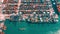 HONG KONG - MAY 2018: Aerial timelapse view of port, containers and fixed cranes from above, fast work activities.