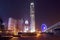 Hong Kong skyscrapers and observation wheel by night