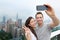 Hong Kong Victoria Peak tourists couple selfie