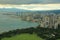 Honolulu city and Wikiki beach under heavy clouds