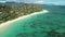 Honolulu, Hawaii, low angle view with drone camera moving forward, sunny day on the beach, color graded