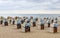 Hooded beach chairs strandkorb at Baltic seacoast in Travemunde, Germany