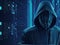 Hooded computer hacker in the shadow with binary codes