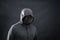 Hooded man with black mask