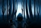 Hooded man in Dark mysterious forest