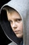 Hooded teenage boy