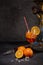 Hookah shisha, glass of cocktail, oranges and ice on dark gray background with copy space. Cocktail Aperol spritz. Hookah bar