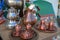 Hookah and Turkish copper dishes on a street table in a cafe