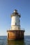 Hoopers Island Lighthouse seascape against blue skies