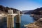 Hoover Dam is a concrete arch-gravity dam in the Black Canyon of the Colorado River