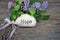 Hope on stone with lilacs